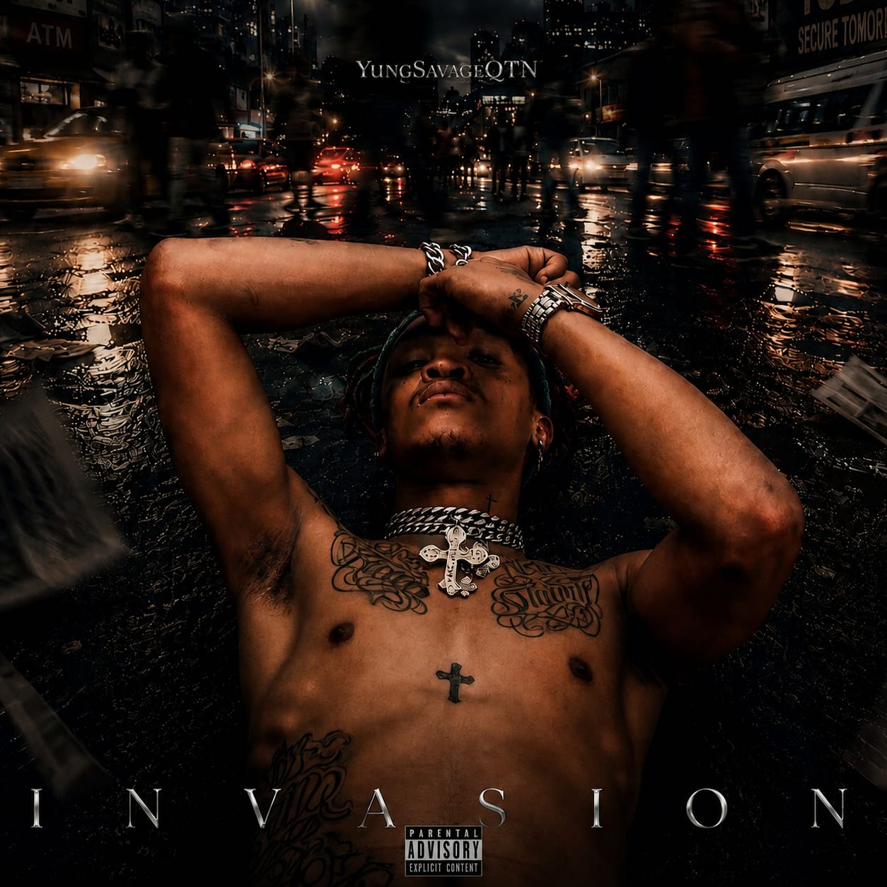 YungSavage QTN lying on a rain-soaked city street for the INVASION album cover